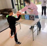 垃圾分類親子同行，美麗城鎮(zhèn)你我共建